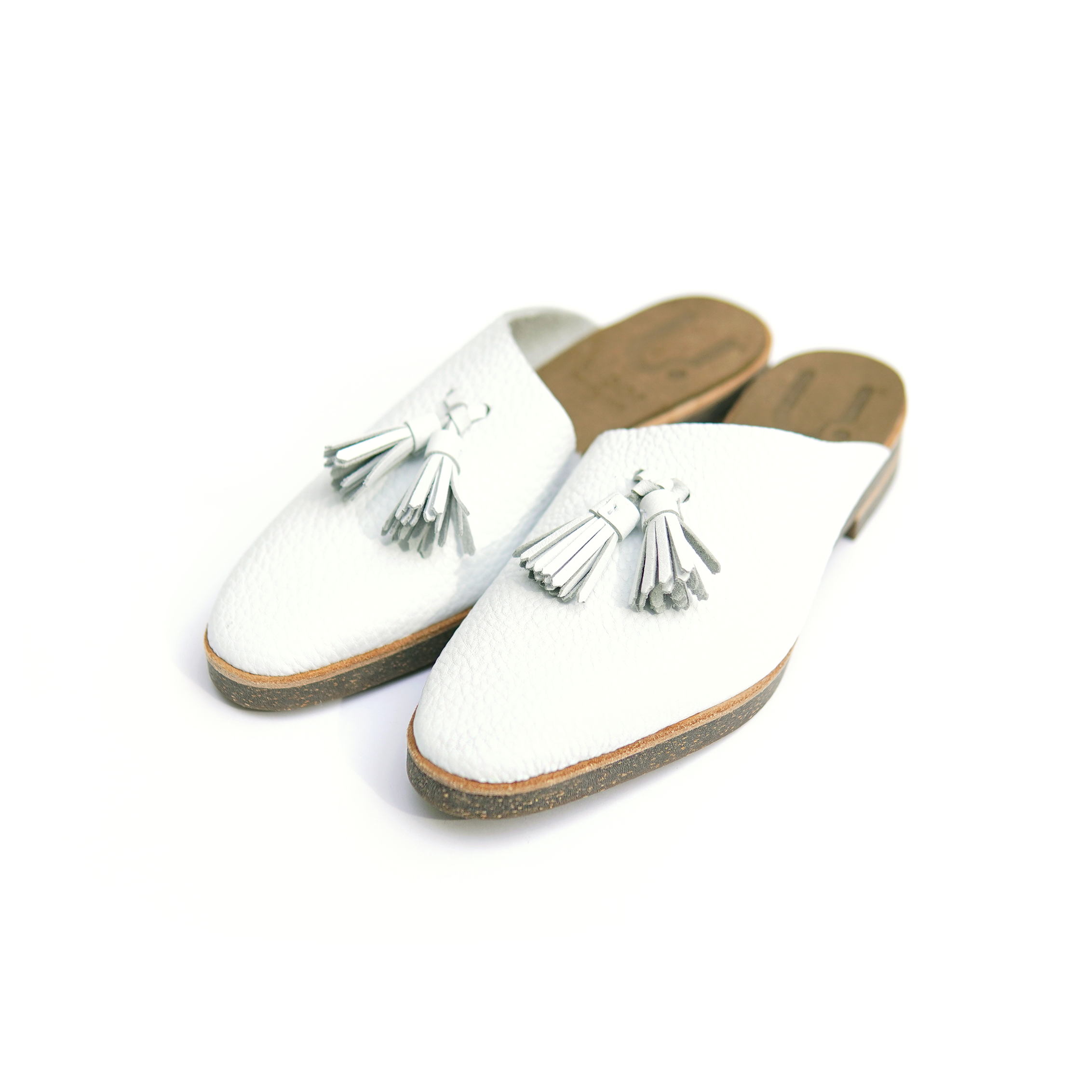 ASYMMETRICAL MULE WHITE TASSEL