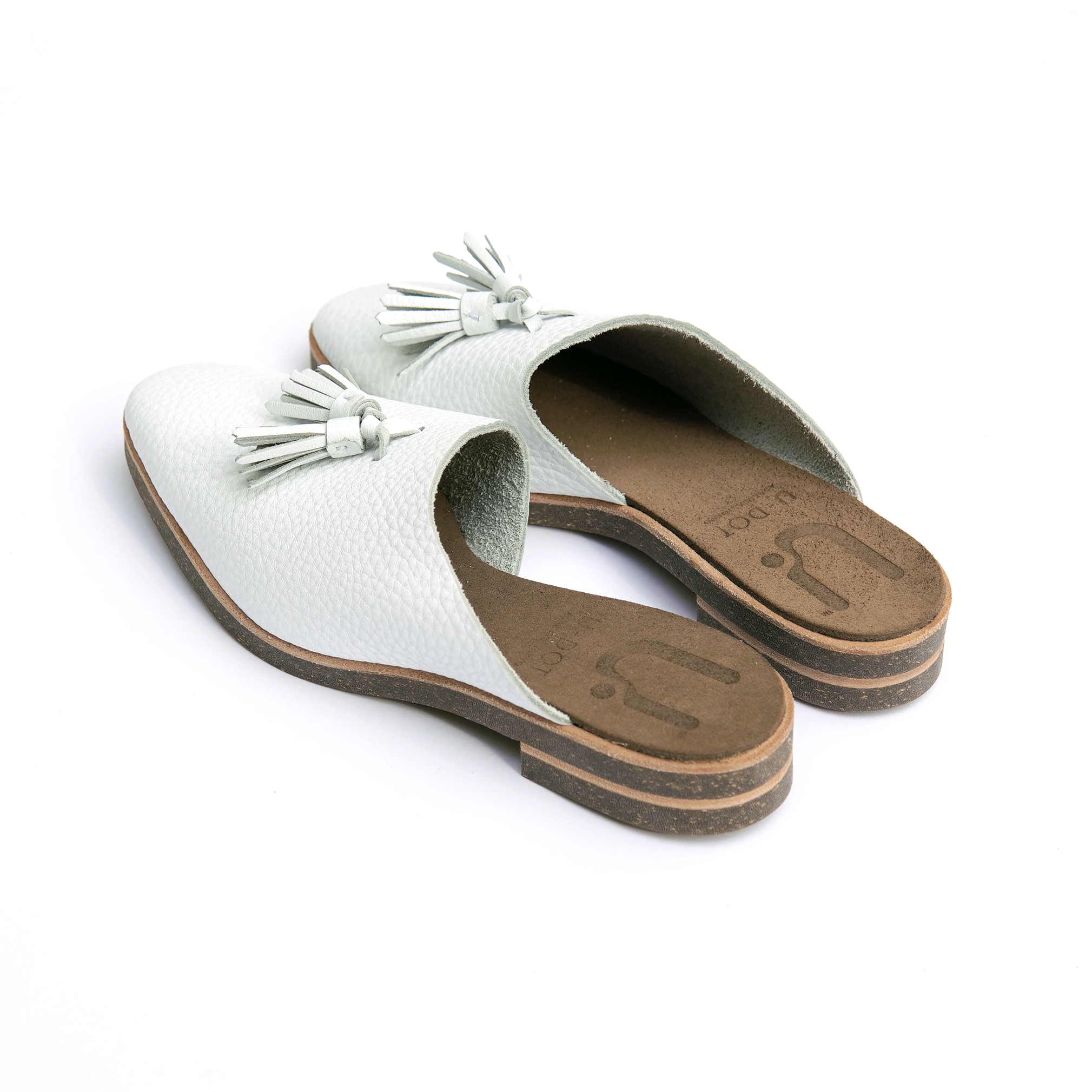 ASYMMETRICAL MULE WHITE TASSEL