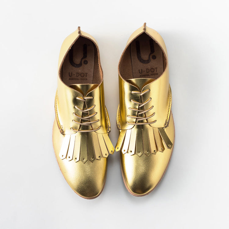 ゴールドメタリックの革靴